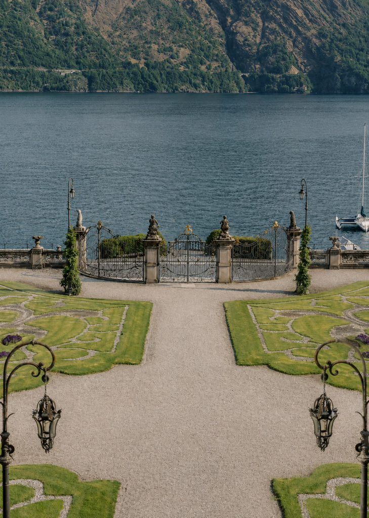 Historic villa gardens overlooking Lake Como during a luxury destination wedding in Italy