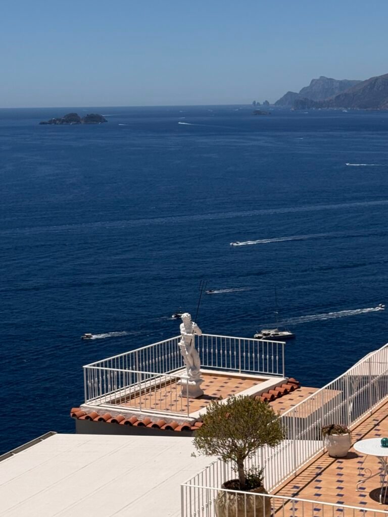 Italy Wedding videographer 5 Italian wedding destination on the Amalfi Coast — luxury terrace overlooking the sea with a view of Capri