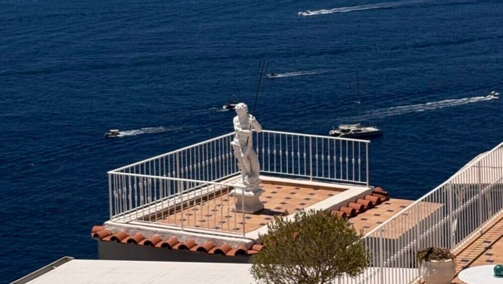 Italian wedding destination on the Amalfi Coast — luxury terrace overlooking the sea with a view of Capri
