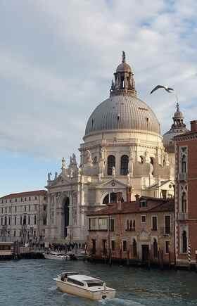 Wedding Videographer Venice 2 Luxury wedding videographer Venice — Santa Maria della Salute dome seen from the Grand Canal near Palazzo Cavalli